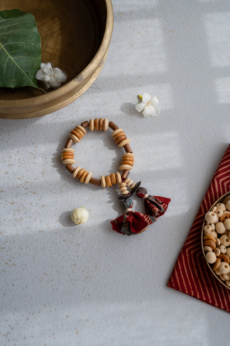 Elasticated Bracelet - Red Tassel